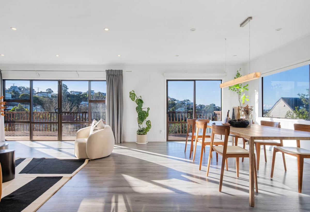1030m2 section, Elegant Living, Sea Views & Rangitoto Zones, 6 beds (1 ensuite) + study 3.5 baths house with garage and swimming pool, A supersized entertaining lounge on the lower level, along with its own bathroom and two generous bedrooms, provides exceptional flexibility. 32 Bellbird Rise, Murrays Bay, Auckland