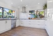 1030m2 section, Elegant Living, Sea Views & Rangitoto Zones, 6 beds (1 ensuite) + study 3.5 baths house with garage and swimming pool, A supersized entertaining lounge on the lower level, along with its own bathroom and two generous bedrooms, provides exceptional flexibility. 32 Bellbird Rise, Murrays Bay, Auckland