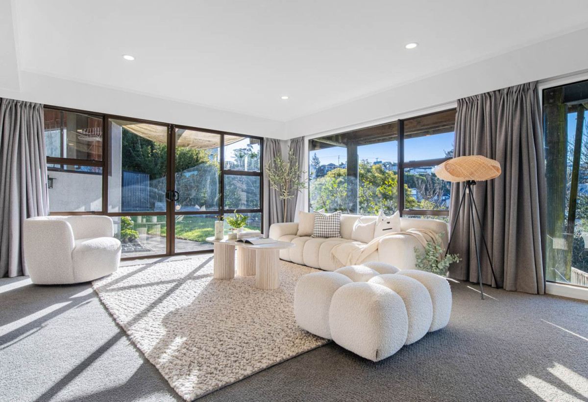 1030m2 section, Elegant Living, Sea Views & Rangitoto Zones, 6 beds (1 ensuite) + study 3.5 baths house with garage and swimming pool, A supersized entertaining lounge on the lower level, along with its own bathroom and two generous bedrooms, provides exceptional flexibility. 32 Bellbird Rise, Murrays Bay, Auckland