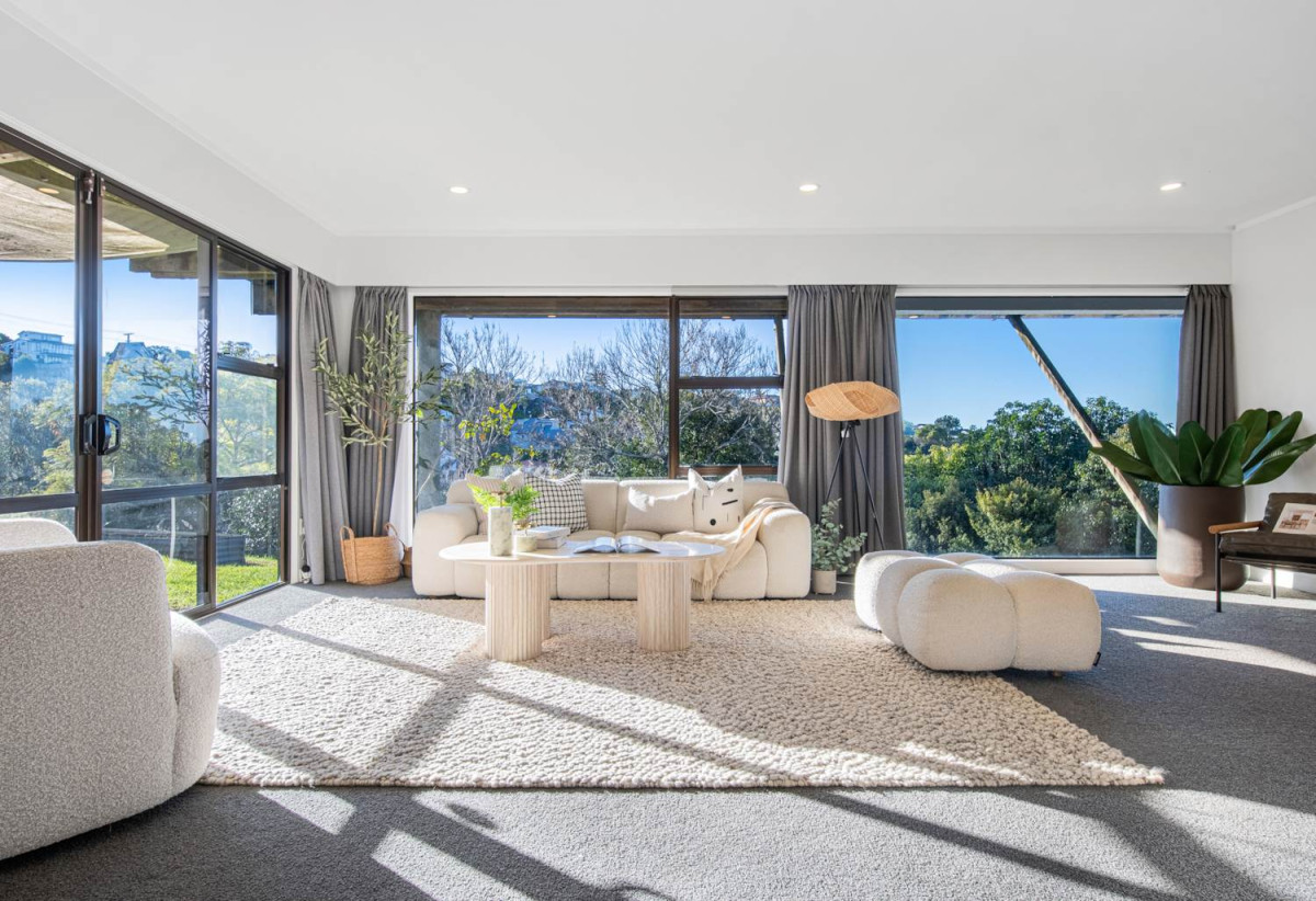 1030m2 section, Elegant Living, Sea Views & Rangitoto Zones, 6 beds (1 ensuite) + study 3.5 baths house with garage and swimming pool, A supersized entertaining lounge on the lower level, along with its own bathroom and two generous bedrooms, provides exceptional flexibility. 32 Bellbird Rise, Murrays Bay, Auckland