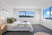 1030m2 section, Elegant Living, Sea Views & Rangitoto Zones, 6 beds (1 ensuite) + study 3.5 baths house with garage and swimming pool, A supersized entertaining lounge on the lower level, along with its own bathroom and two generous bedrooms, provides exceptional flexibility. 32 Bellbird Rise, Murrays Bay, Auckland