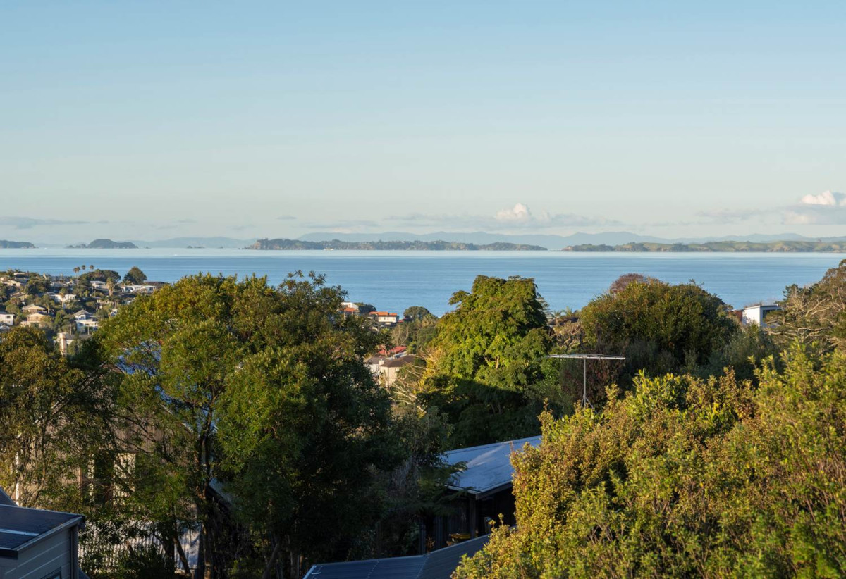 1030m2 section, Elegant Living, Sea Views & Rangitoto Zones, 6 beds (1 ensuite) + study 3.5 baths house with garage and swimming pool, A supersized entertaining lounge on the lower level, along with its own bathroom and two generous bedrooms, provides exceptional flexibility. 32 Bellbird Rise, Murrays Bay, Auckland