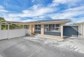 Rangitoto College zone, Brick and tile 2 beds + storage room or Flexi room (3.13 x 2.05M) 1 bath house with garage, 2/4 Noumea Place, Mairangi Bay, Auckland