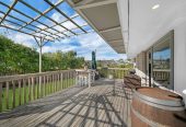 Rangitoto College zone, Brick and tile 2 beds + storage room or Flexi room (3.13 x 2.05M) 1 bath house with garage, 2/4 Noumea Place, Mairangi Bay, Auckland