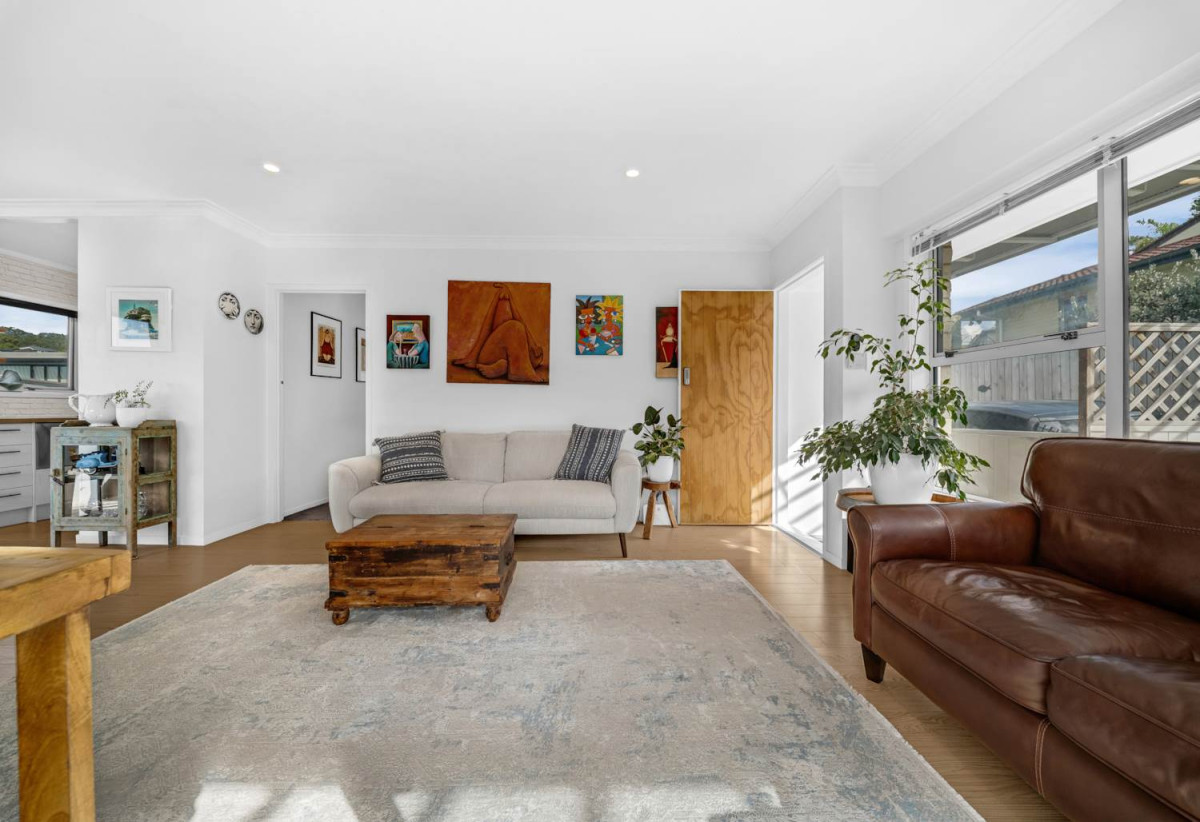 Rangitoto College zone, Brick and tile 2 beds + storage room or Flexi room (3.13 x 2.05M) 1 bath house with garage, 2/4 Noumea Place, Mairangi Bay, Auckland