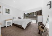 Rangitoto College zone, Brick and tile 2 beds + storage room or Flexi room (3.13 x 2.05M) 1 bath house with garage, 2/4 Noumea Place, Mairangi Bay, Auckland