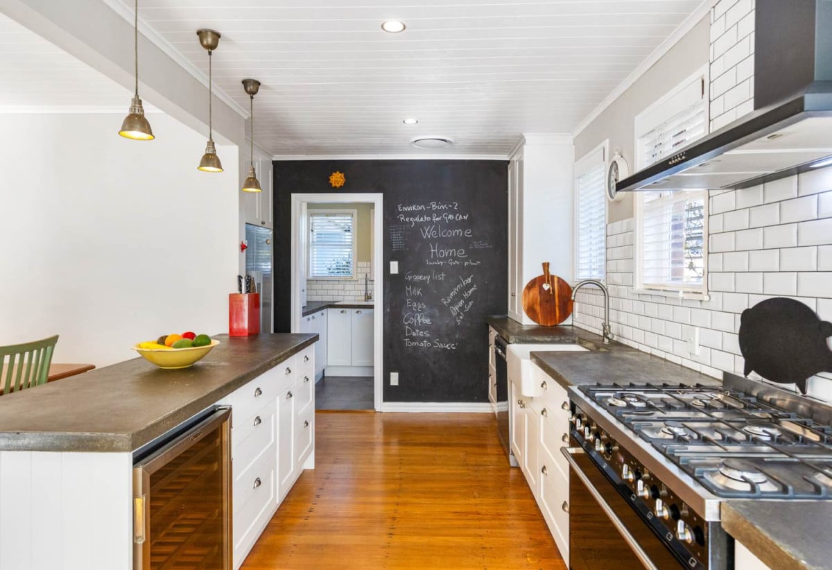 685m2 section, 170m2 Renovated 3 beds (1 ensuite) 2 baths house with double garage, Built-in pizza oven & wine fridge, Central heating, new long run roof, COC for new electrical wiring & new CCC for the professionally completed extension, Fully fenced and gated, 11 Alamein Road, Panmure, Auckland
