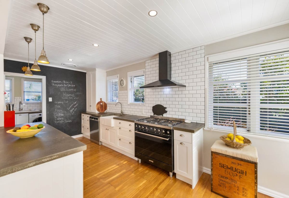 685m2 section, 170m2 Renovated 3 beds (1 ensuite) 2 baths house with double garage, Built-in pizza oven & wine fridge, Central heating, new long run roof, COC for new electrical wiring & new CCC for the professionally completed extension, Fully fenced and gated, 11 Alamein Road, Panmure, Auckland
