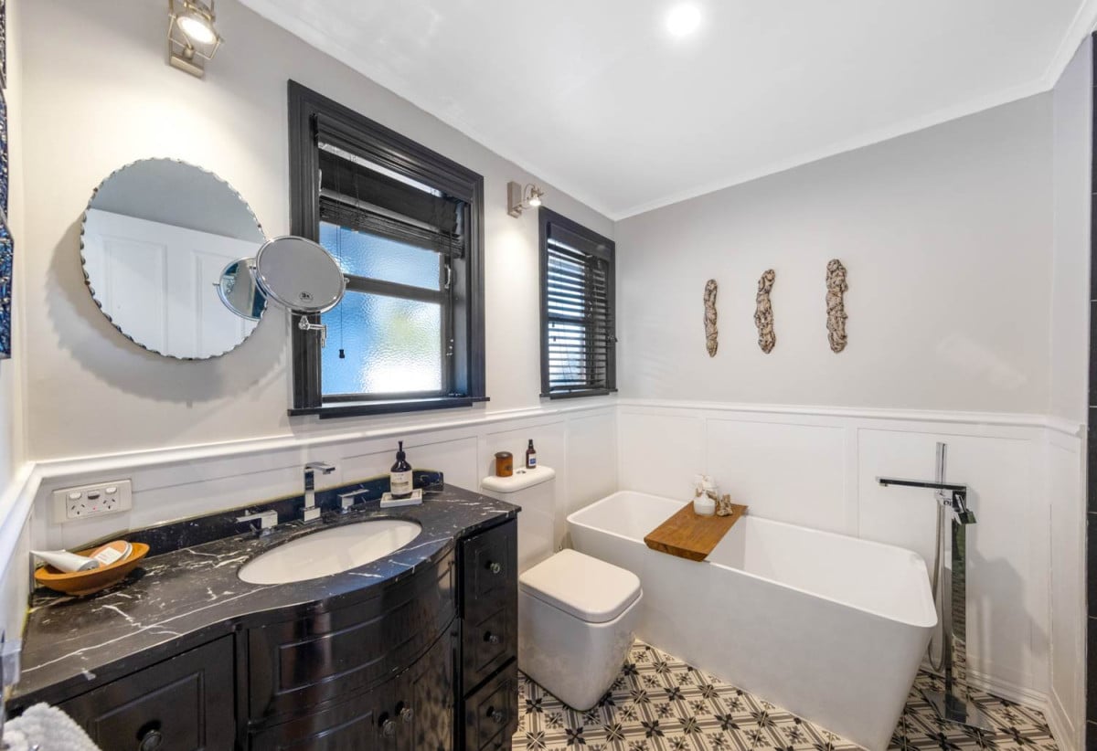 685m2 section, 170m2 Renovated 3 beds (1 ensuite) 2 baths house with double garage, Built-in pizza oven & wine fridge, Central heating, new long run roof, COC for new electrical wiring & new CCC for the professionally completed extension, Fully fenced and gated, 11 Alamein Road, Panmure, Auckland