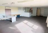 MORTGAGEE SALE, 949m2 section, Positioned next door to Stanmore Bay School, Previously consented and operated as an educational training facility for a number of years, the layout comprises multiple office spaces, a large open-plan area, kitchen facilities and two separate toilets, 32 Waiora Road, Stanmore Bay, Auckland