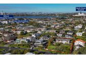 1322m2 section with Sea Views, Double Westlake school zone, Brick and tile 4 beds 3 baths house with double garage, Lower Level: Second living area, large fourth bedroom, additional bathroom, and a pool for relaxation. 24 Prospect Terrace, Milford, Auckland