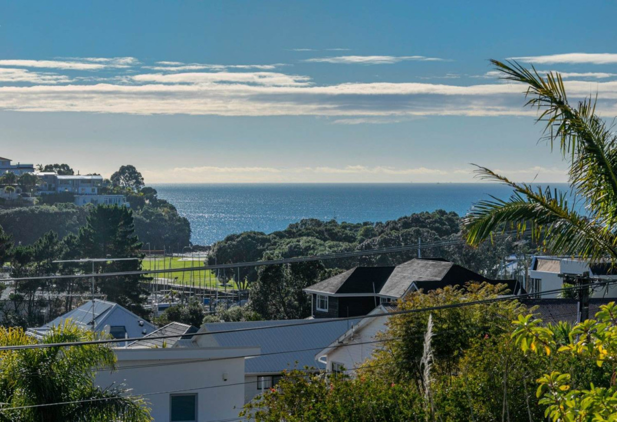 1322m2 section with Sea Views, Double Westlake school zone, Brick and tile 4 beds 3 baths house with double garage, Lower Level: Second living area, large fourth bedroom, additional bathroom, and a pool for relaxation. 24 Prospect Terrace, Milford, Auckland