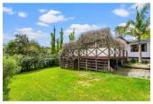 943m2 section, Tenants in place – income from day one, 2 beds 1 bath house with carport, Near beaches, shops, schools, transport, 355 Whangaparaoa Road, Stanmore Bay, Auckland