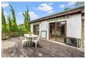 943m2 section, Tenants in place – income from day one, 2 beds 1 bath house with carport, Near beaches, shops, schools, transport, 355 Whangaparaoa Road, Stanmore Bay, Auckland