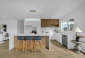 4 beds (2 ensuites) 3 baths house with double garage, 97 Mutetai Road, Clarks Beach, Auckland