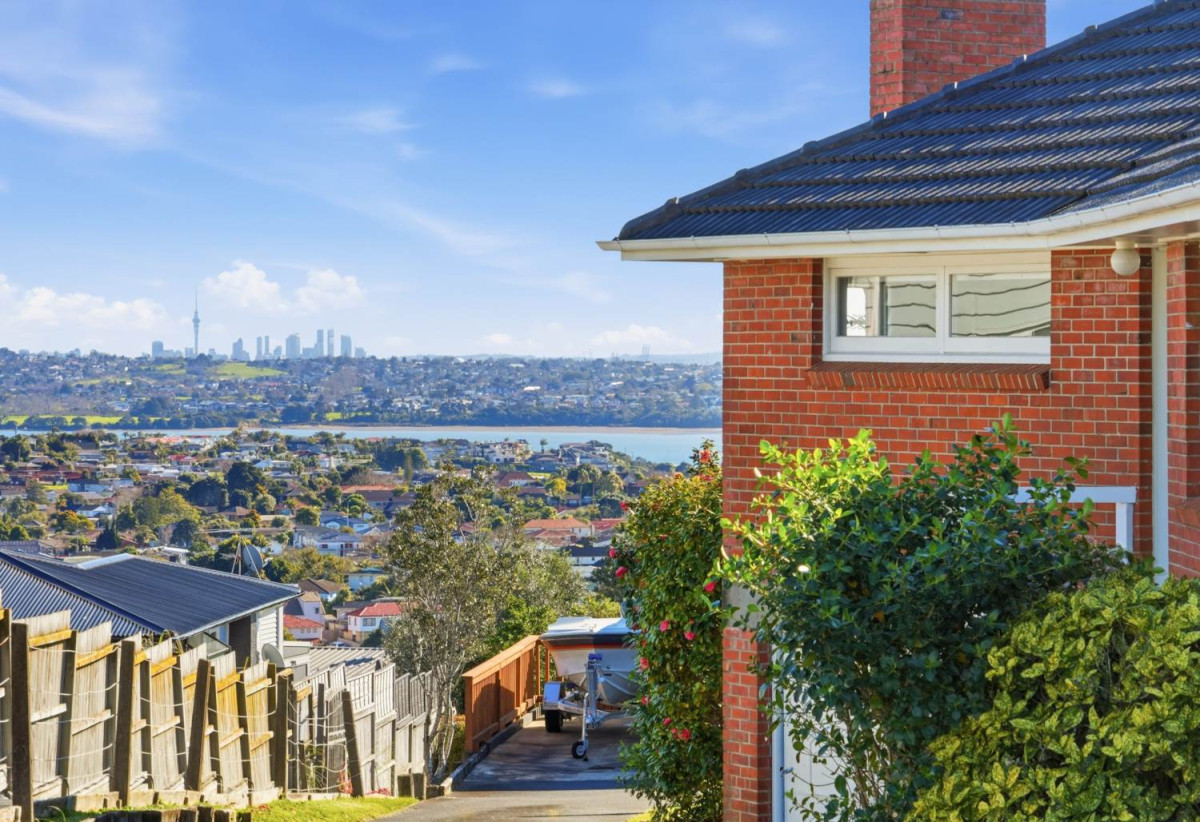 Half of 1130m2 section, Macleans College zone, Sea Views and Sky city views, Brick and tile 3 beds 2 baths house with garage, 1/68 Bleakhouse Road, Bucklands Beach, Auckland