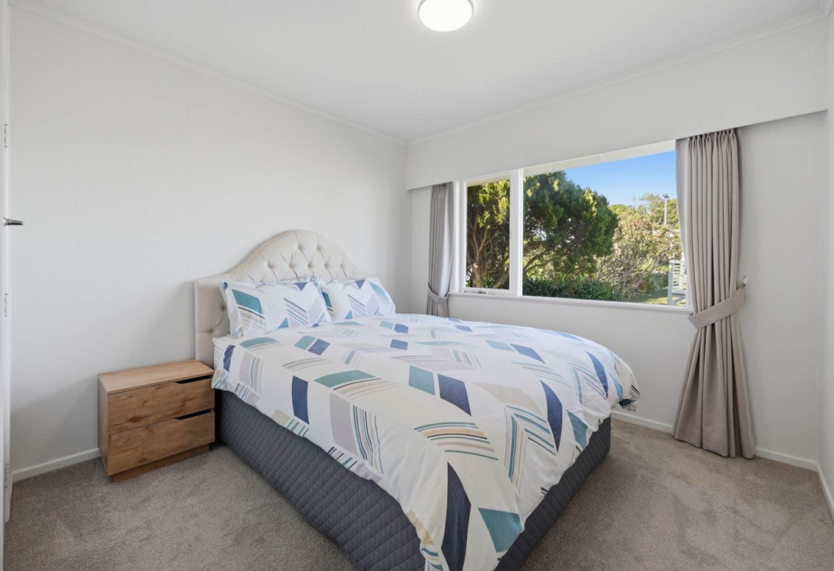 Half of 1130m2 section, Macleans College zone, Sea Views and Sky city views, Brick and tile 3 beds 2 baths house with garage, 1/68 Bleakhouse Road, Bucklands Beach, Auckland