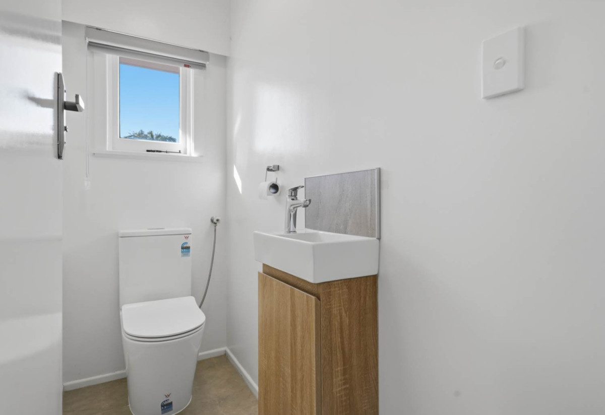 Half of 1130m2 section, Macleans College zone, Sea Views and Sky city views, Brick and tile 3 beds 2 baths house with garage, 1/68 Bleakhouse Road, Bucklands Beach, Auckland