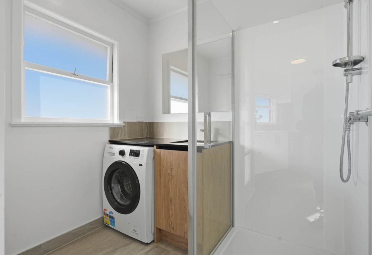 Half of 1130m2 section, Macleans College zone, Sea Views and Sky city views, Brick and tile 3 beds 2 baths house with garage, 1/68 Bleakhouse Road, Bucklands Beach, Auckland