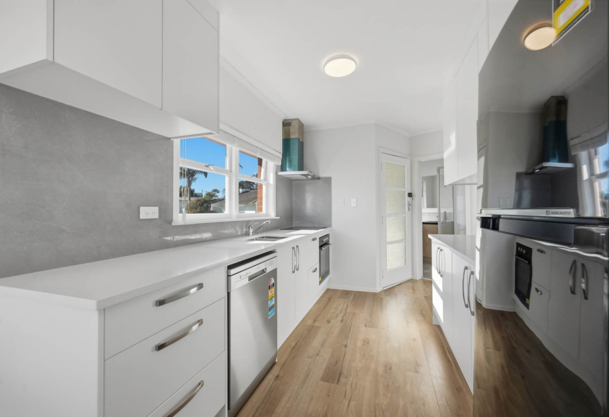 Half of 1130m2 section, Macleans College zone, Sea Views and Sky city views, Brick and tile 3 beds 2 baths house with garage, 1/68 Bleakhouse Road, Bucklands Beach, Auckland