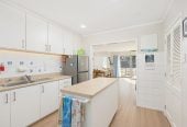 The owners are ready for a bigger home. 130m2 Brick and tile 2 beds 1 bath home with garage, 2/219 Edmonton Road, Te Atatu South, Auckland
