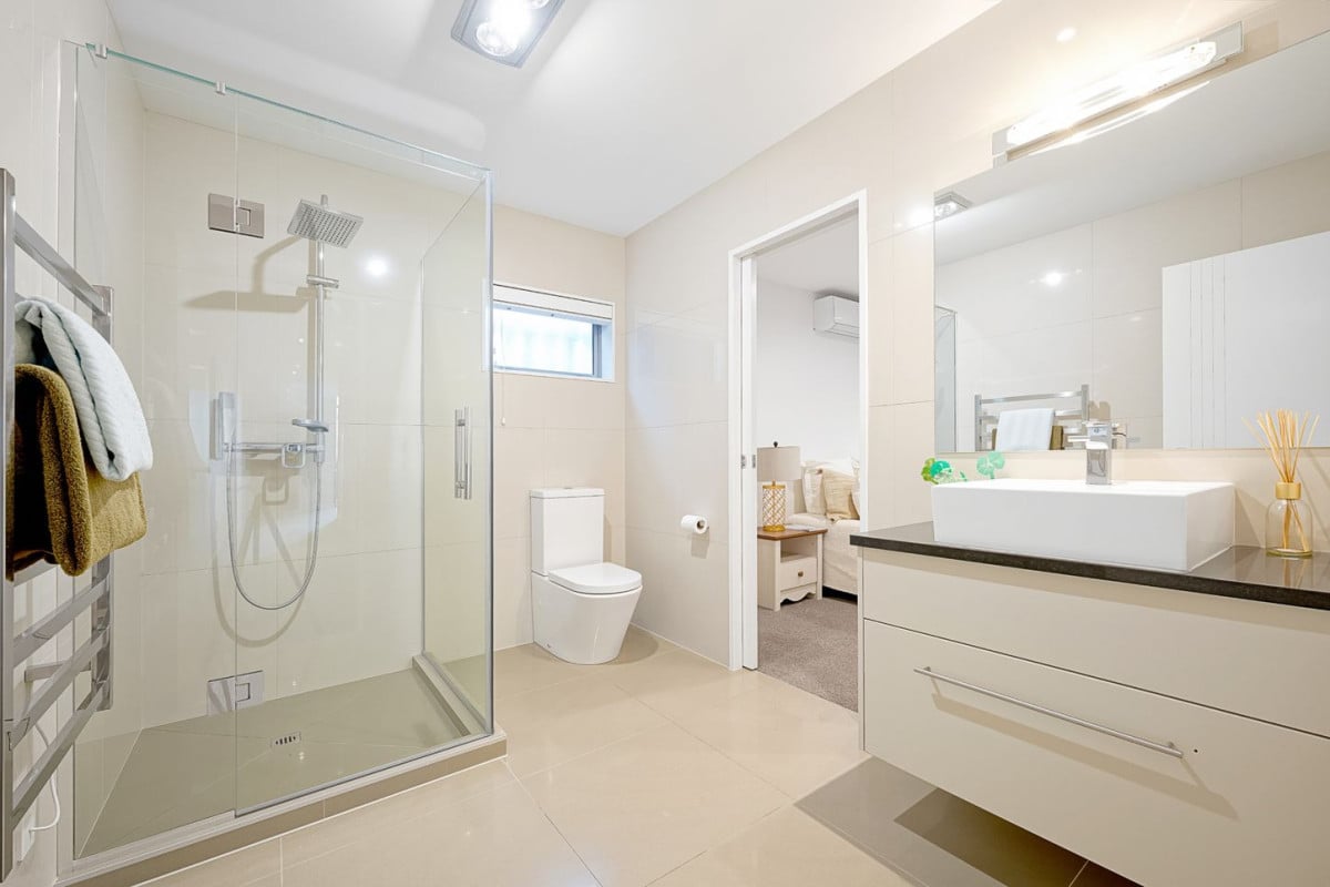 621m2 section, 2 kitchens, 334m2 5 beds ( 2 ensuites, Two additional semi-ensuite) 4 baths house with double garage, 2 ensuites ground floor, 9 Platinum Rise, Ranui, Auckland