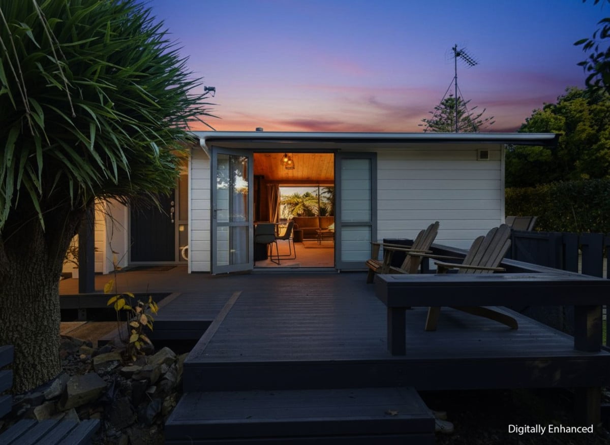1088m2 section, 3 beds 1 bath house with carport, wooden walls and ceilings wrap around the interconnected lounge, dining area and kitchen. and Outside, the multi-level timber deck, 37A Youngs Road, Papakura, Auckland