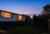 1088m2 section, 3 beds 1 bath house with carport, wooden walls and ceilings wrap around the interconnected lounge, dining area and kitchen. and Outside, the multi-level timber deck, 37A Youngs Road, Papakura, Auckland