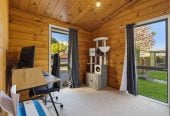 1088m2 section, 3 beds 1 bath house with carport, wooden walls and ceilings wrap around the interconnected lounge, dining area and kitchen. and Outside, the multi-level timber deck, 37A Youngs Road, Papakura, Auckland