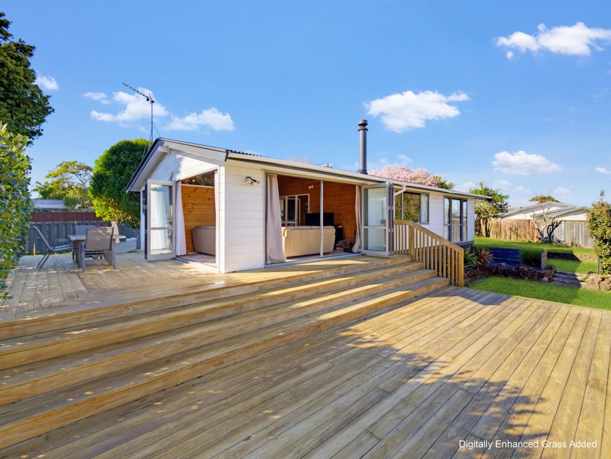 1088m2 section, 3 beds 1 bath house with carport, wooden walls and ceilings wrap around the interconnected lounge, dining area and kitchen. and Outside, the multi-level timber deck, 37A Youngs Road, Papakura, Auckland