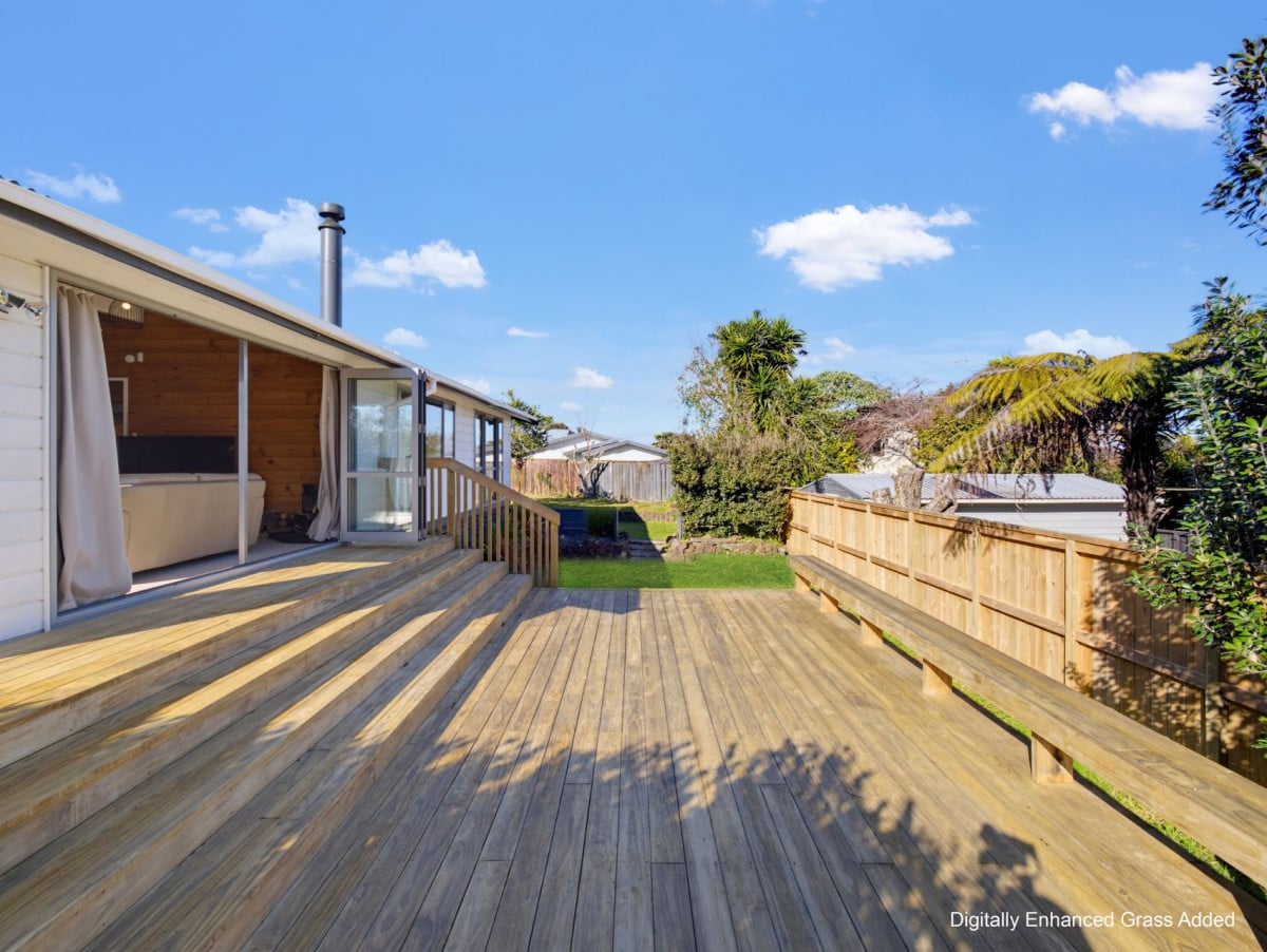 1088m2 section, 3 beds 1 bath house with carport, wooden walls and ceilings wrap around the interconnected lounge, dining area and kitchen. and Outside, the multi-level timber deck, 37A Youngs Road, Papakura, Auckland
