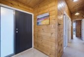 1088m2 section, 3 beds 1 bath house with carport, wooden walls and ceilings wrap around the interconnected lounge, dining area and kitchen. and Outside, the multi-level timber deck, 37A Youngs Road, Papakura, Auckland
