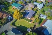 1088m2 section, 3 beds 1 bath house with carport, wooden walls and ceilings wrap around the interconnected lounge, dining area and kitchen. and Outside, the multi-level timber deck, 37A Youngs Road, Papakura, Auckland
