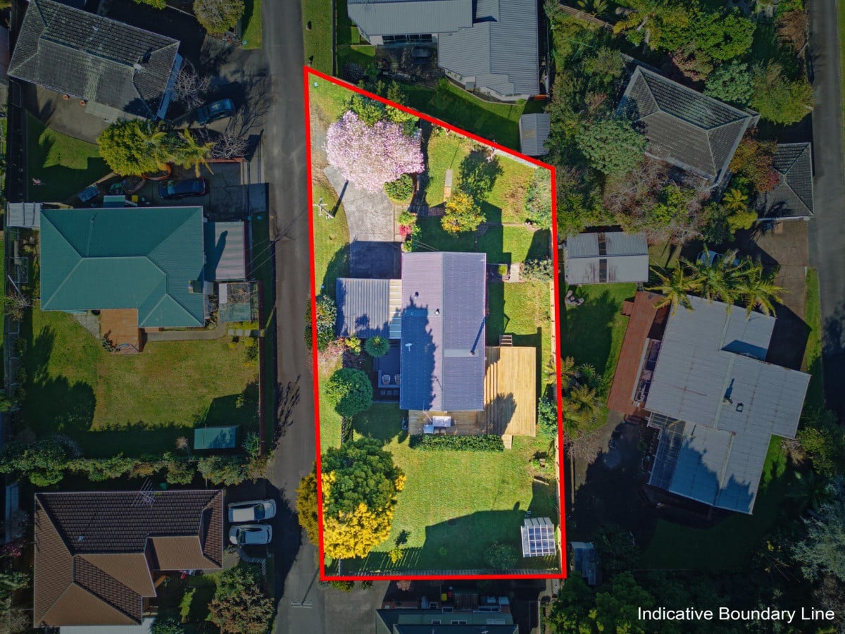 1088m2 section, 3 beds 1 bath house with carport, wooden walls and ceilings wrap around the interconnected lounge, dining area and kitchen. and Outside, the multi-level timber deck, 37A Youngs Road, Papakura, Auckland