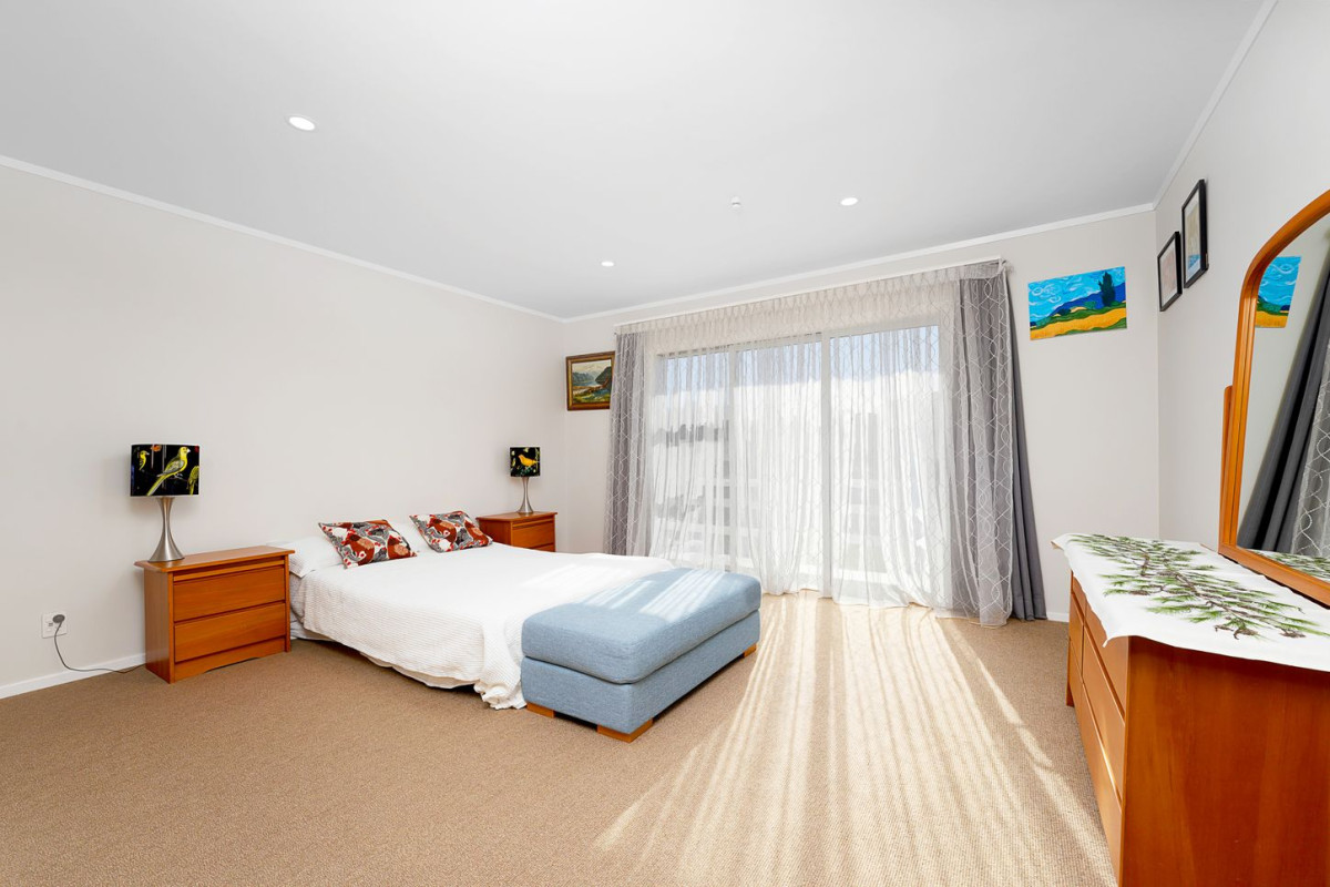 The owners are ready for a bigger home. 130m2 Brick and tile 2 beds 1 bath home with garage, 2/219 Edmonton Road, Te Atatu South, Auckland