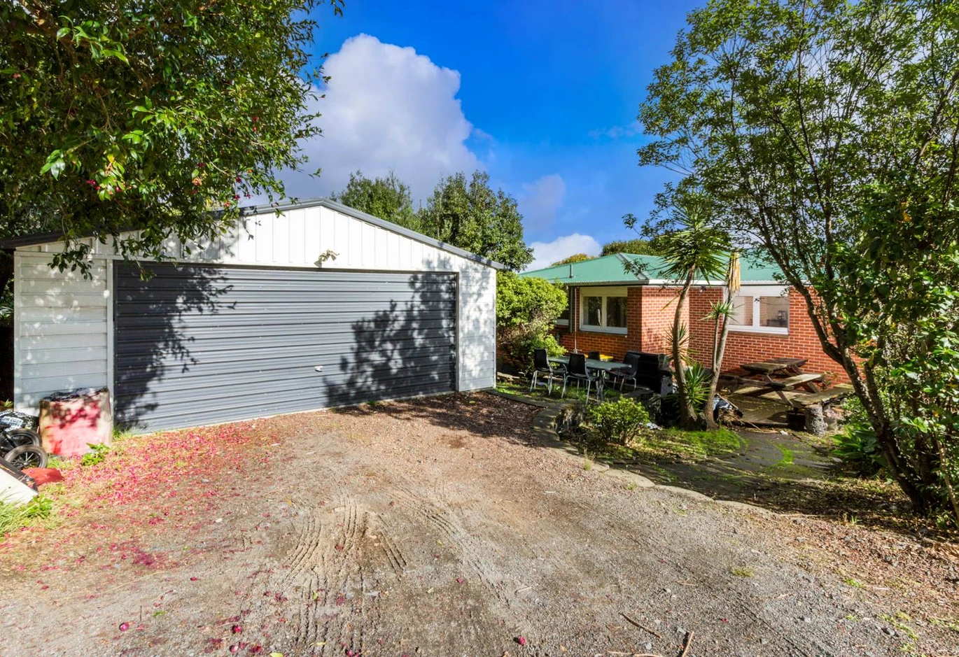 575m2 section on Local Centre zoning, 118m2 Brick 3 beds 2 baths house with carport and standalone double garage, Downstairs a massive rumpus room and Complete with an additional bathroom and laundry, 450 Don Buck Road Massey, Auckland
