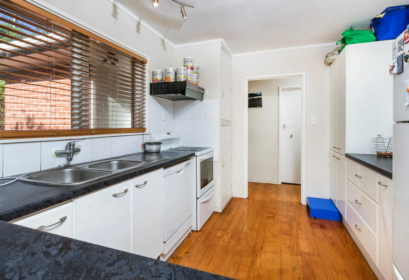 575m2 section on Local Centre zoning, 118m2 Brick 3 beds 2 baths house with carport and standalone double garage, Downstairs a massive rumpus room and Complete with an additional bathroom and laundry, 450 Don Buck Road Massey, Auckland