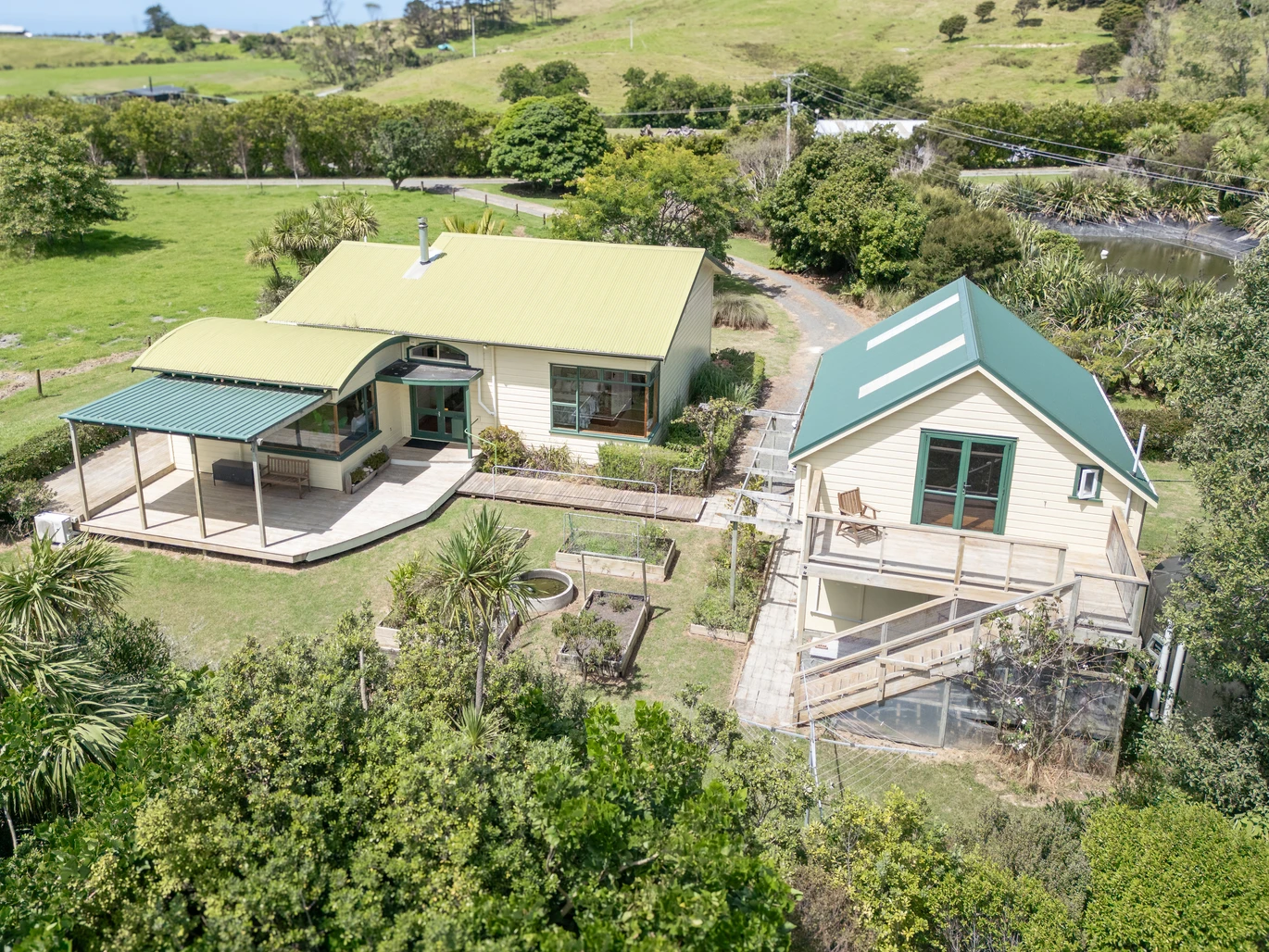 43000m2 section by the sea, LIFESTYLE, INCOME & OPPORTUNITY, Highlights include an impressive four-bay greenhouse spanning approximately 1,800sqm, a 1.2 million litre lined water reservoir, substantial workshop and packing facilities, a walk-in chiller, generous office space, and established propagation areas. a 3 beds bungalow surrounded by established cottage, A separate garage with loft accommodation, 100 Robinson Road Whangarei Heads, Whangarei District