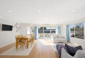 The owners are ready for a bigger home. 130m2 Brick and tile 2 beds 1 bath home with garage, 2/219 Edmonton Road, Te Atatu South, Auckland