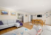 The owners are ready for a bigger home. 130m2 Brick and tile 2 beds 1 bath home with garage, 2/219 Edmonton Road, Te Atatu South, Auckland