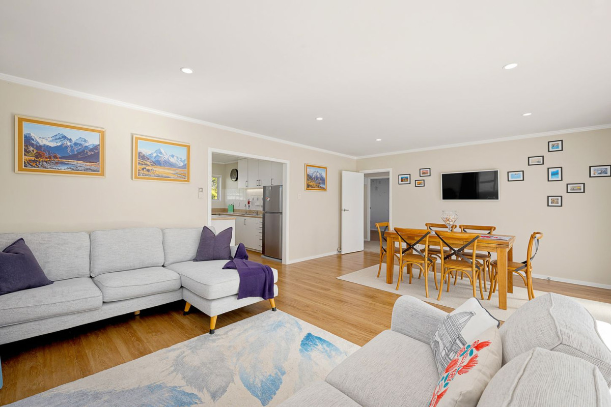 The owners are ready for a bigger home. 130m2 Brick and tile 2 beds 1 bath home with garage, 2/219 Edmonton Road, Te Atatu South, Auckland