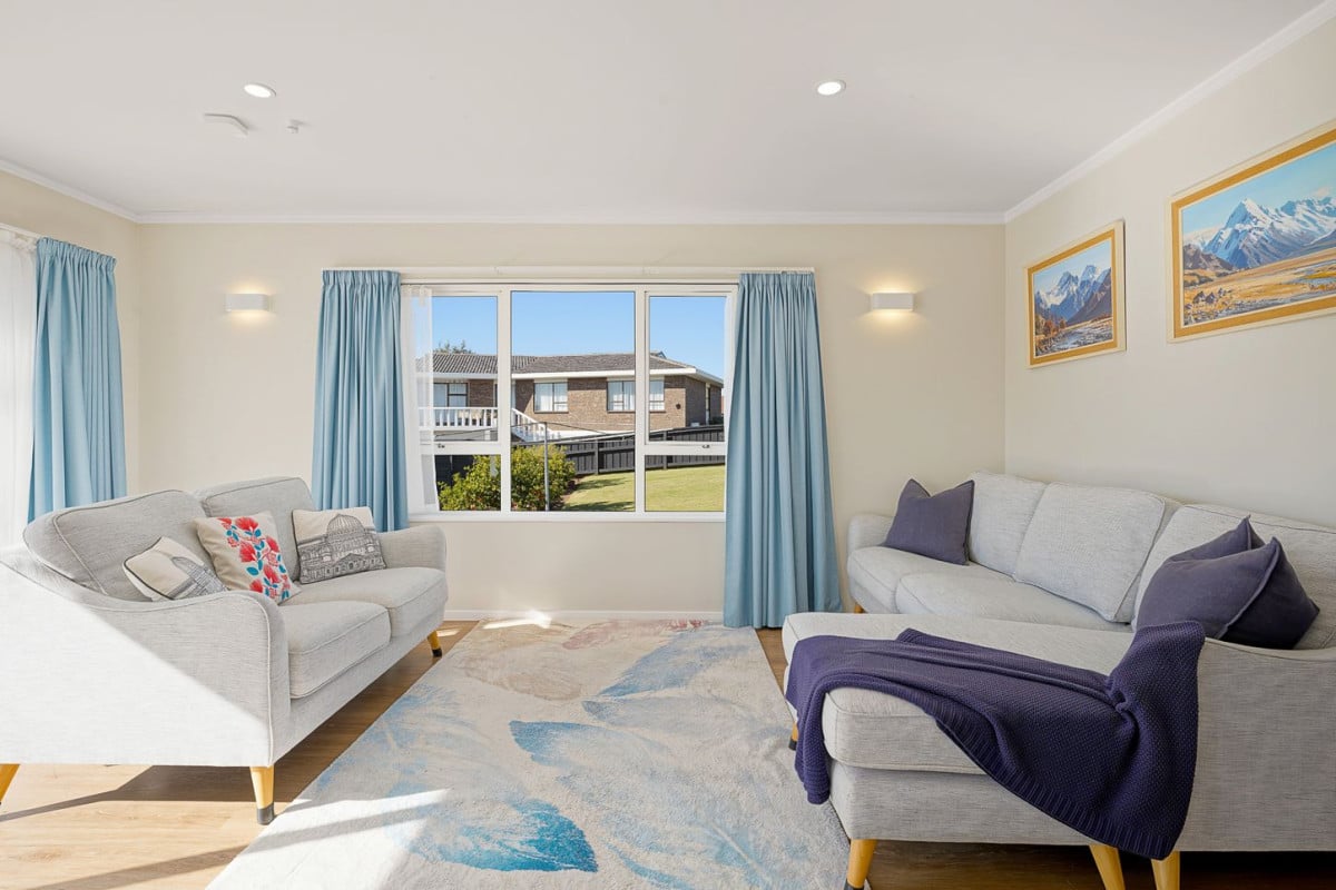 The owners are ready for a bigger home. 130m2 Brick and tile 2 beds 1 bath home with garage, 2/219 Edmonton Road, Te Atatu South, Auckland