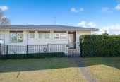 The owners are ready for a bigger home. 130m2 Brick and tile 2 beds 1 bath home with garage, 2/219 Edmonton Road, Te Atatu South, Auckland