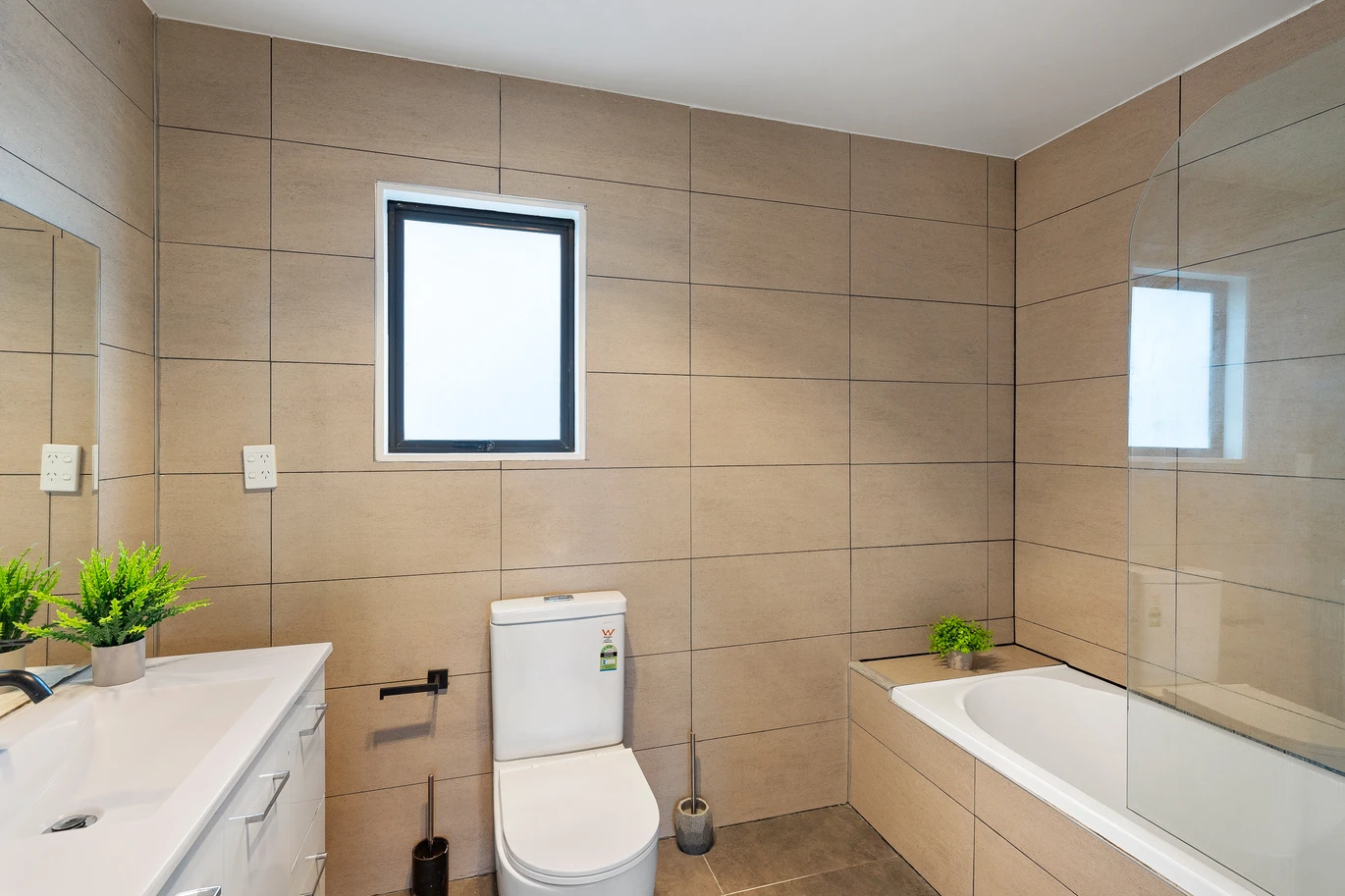 450m2 section, positioned right beside the legendary racecourse, 227m2 5 beds 3.5 baths (3 ensuites with one that doubles as both an ensuite and semi ensuite – see floorplan) with double garage, 58 Nacton Lane Avondale, Auckland