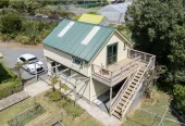 43000m2 section by the sea, LIFESTYLE, INCOME & OPPORTUNITY, Highlights include an impressive four-bay greenhouse spanning approximately 1,800sqm, a 1.2 million litre lined water reservoir, substantial workshop and packing facilities, a walk-in chiller, generous office space, and established propagation areas. a 3 beds bungalow surrounded by established cottage, A separate garage with loft accommodation, 100 Robinson Road Whangarei Heads, Whangarei District