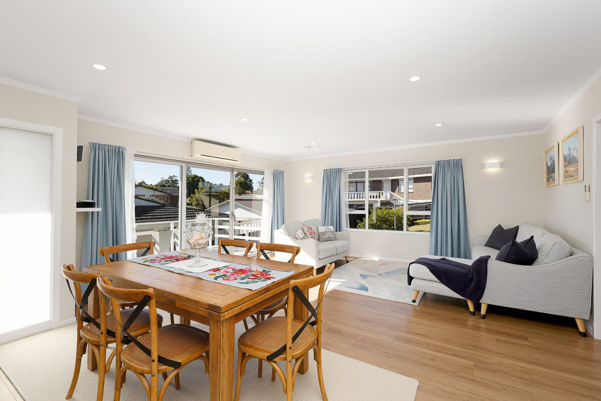 The owners are ready for a bigger home. 130m2 Brick and tile 2 beds 1 bath home with garage, 2/219 Edmonton Road, Te Atatu South, Auckland