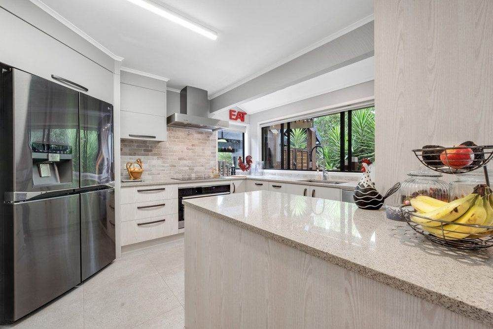 1222m2 section, Macleans College zone, 5 beds + office 4 baths house with double garage and double car port, 80A Beach Road, Mellons Bay, Auckland