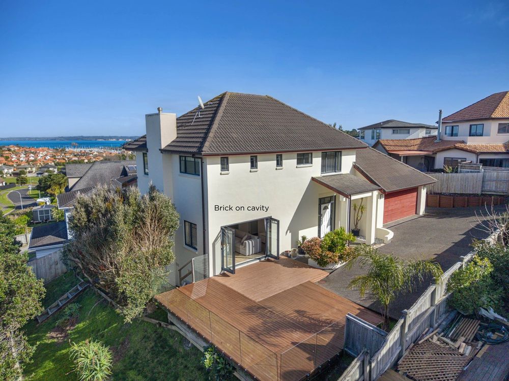 575m2 section, Brick and tile 4 beds 2 baths house with double garage, 103 Alec Craig Way, Gulf Harbour, Auckland
