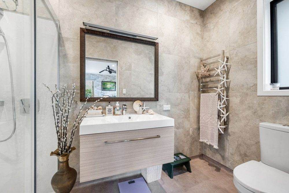 1222m2 section, Macleans College zone, 5 beds + office 4 baths house with double garage and double car port, 80A Beach Road, Mellons Bay, Auckland