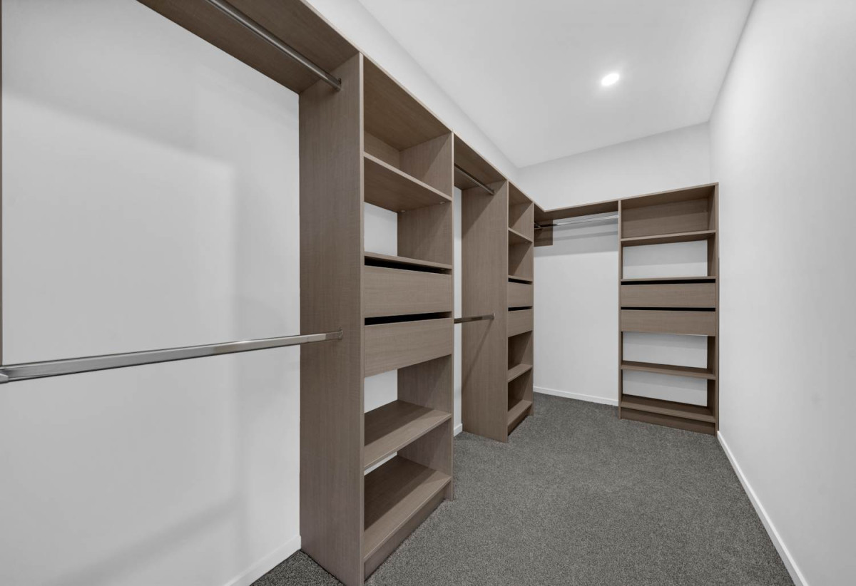 Brandnew 5 beds 4.5 baths house with garage, The ground floor features a private wing with a spacious bedroom, separate bathroom, and its own living area. 13 Star Cross Road, Karaka, Auckland